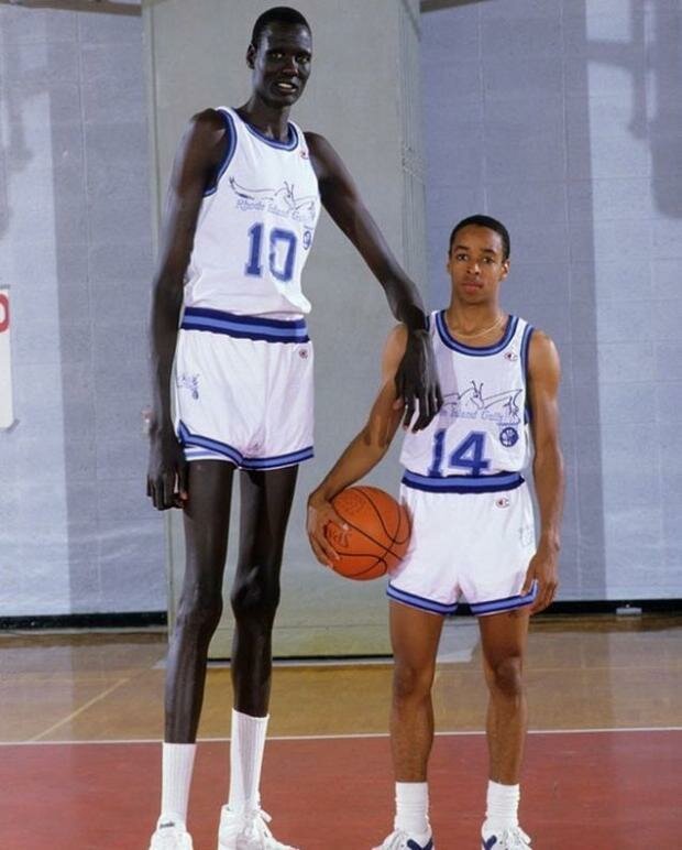 Manuta Bol, a basketball player from Sudan, 231 cm. It is noteworthy that he was born in a family of giants — his mother’s height was 206, and his father’s height was 201 cm.